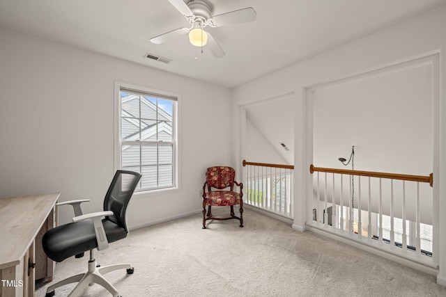 home office with visible vents, baseboards, ceiling fan, and carpet floors
