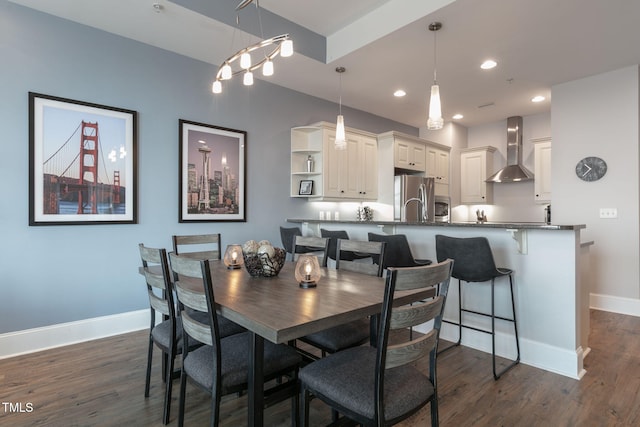 dining room featuring baseboards, recessed lighting, and dark wood-style flooring