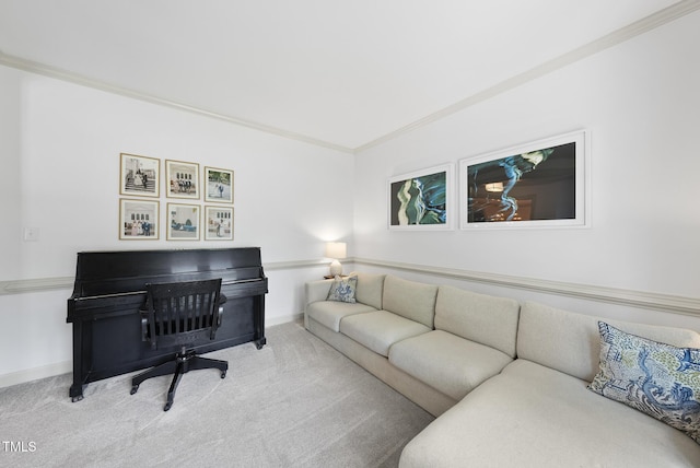 carpeted living area featuring crown molding and baseboards