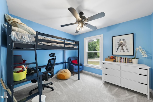 bedroom featuring baseboards, carpet flooring, and a ceiling fan