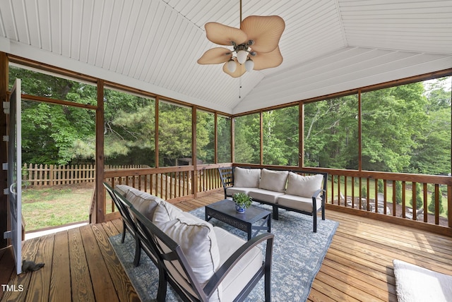sunroom with outdoor lounge area and a ceiling fan