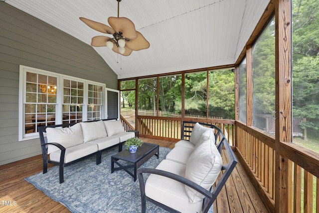 sunroom / solarium featuring a ceiling fan, outdoor lounge area, and plenty of natural light
