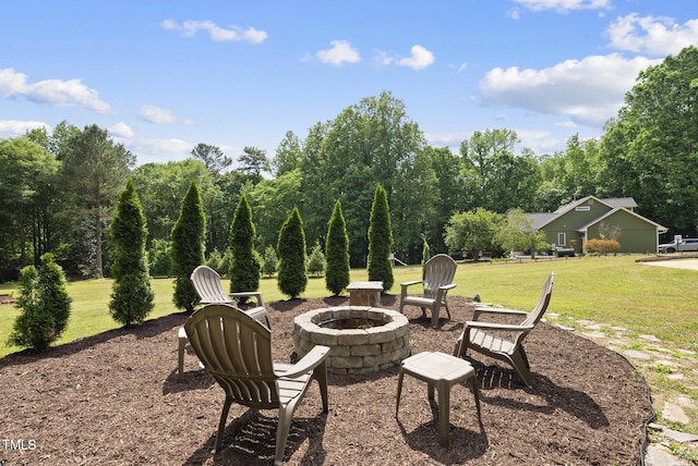 view of patio with a fire pit