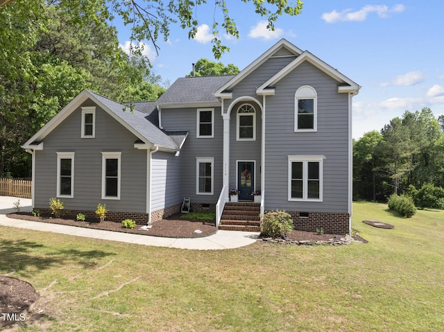 view of front facade featuring a shingled roof, a front lawn, fence, and crawl space