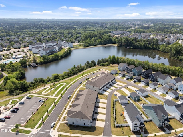 birds eye view of property featuring a residential view and a water view