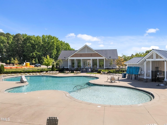 pool featuring a patio area