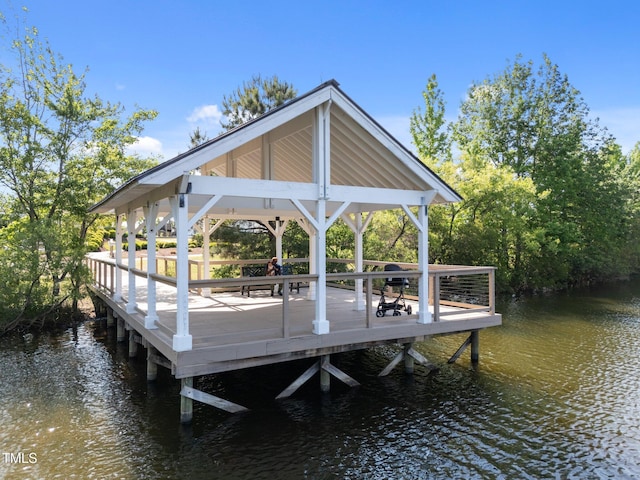 dock area with a gazebo and a water view