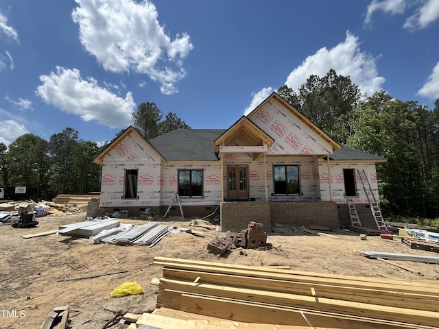 property under construction featuring brick siding