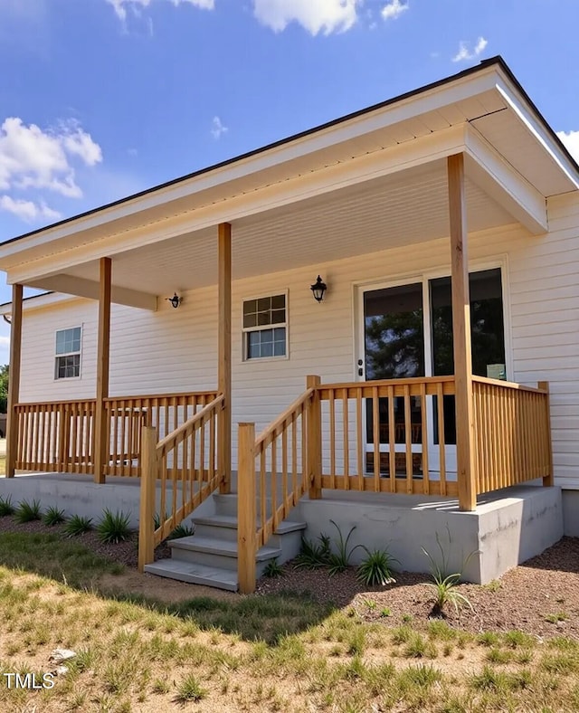 5029 Carole Dr, Wilson, NC 27893 - property entrance with a porch
