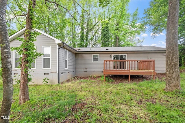 5613 Deerborn Dr, Apex, NC 27539 - rear view of house featuring a wooden deck and crawl space
