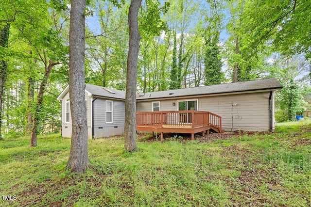 5613 Deerborn Dr, Apex, NC 27539 - rear view of property featuring a deck and crawl space