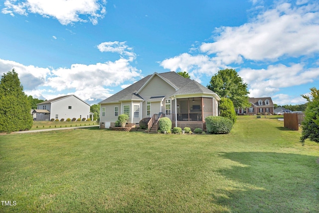 95 Live Oak Dr, Louisburg, NC 27549 - view of front facade with a sunroom, a front yard, crawl space, and a shingled roof
