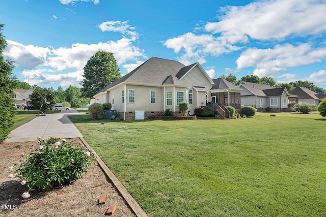 95 Live Oak Dr, Louisburg, NC 27549 - view of front of home featuring crawl space, a front yard, a sunroom, and a shingled roof