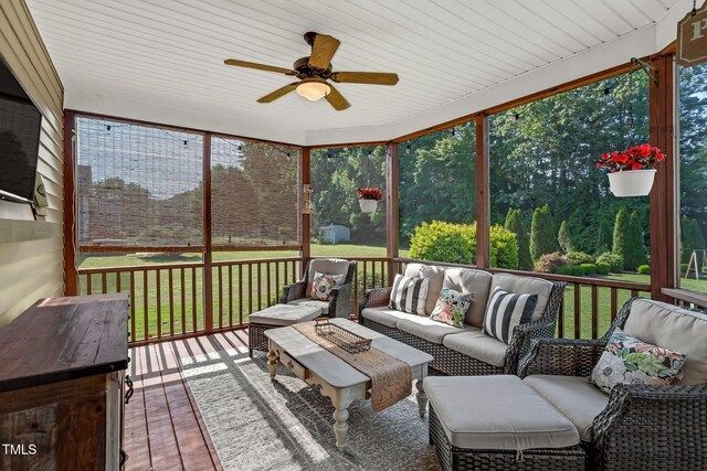 95 Live Oak Dr, Louisburg, NC 27549 - sunroom / solarium with outdoor lounge area, a ceiling fan, and healthy amount of natural light