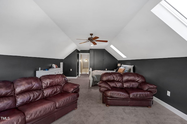 95 Live Oak Dr, Louisburg, NC 27549 - carpeted cinema featuring a skylight, a ceiling fan, lofted ceiling, and baseboards