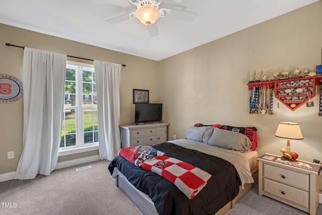 95 Live Oak Dr, Louisburg, NC 27549 - bedroom featuring light carpet, baseboards, and ceiling fan