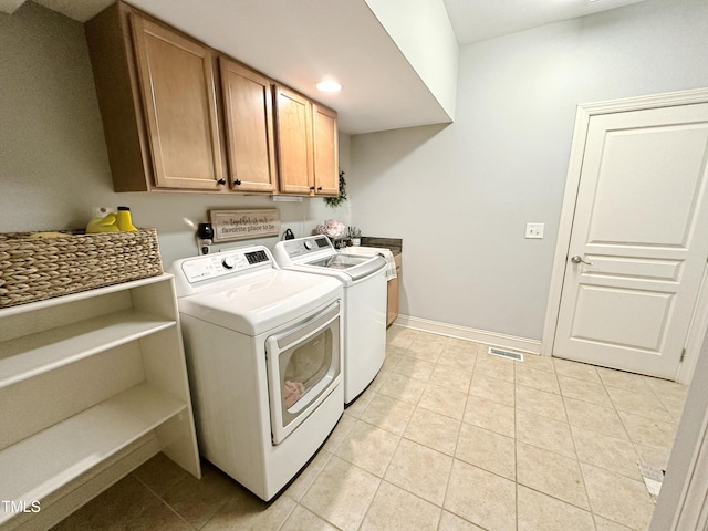95 Live Oak Dr, Louisburg, NC 27549 - clothes washing area with cabinet space, washing machine and clothes dryer, light tile patterned floors, recessed lighting, and baseboards