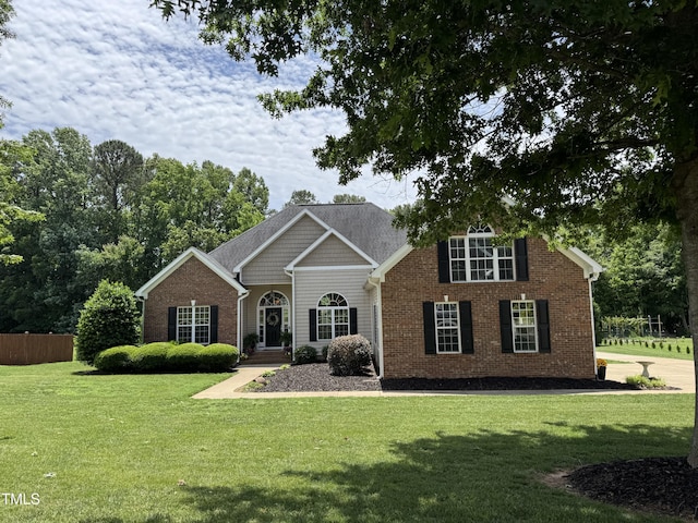 95 Live Oak Dr, Louisburg, NC 27549 - view of front facade with brick siding