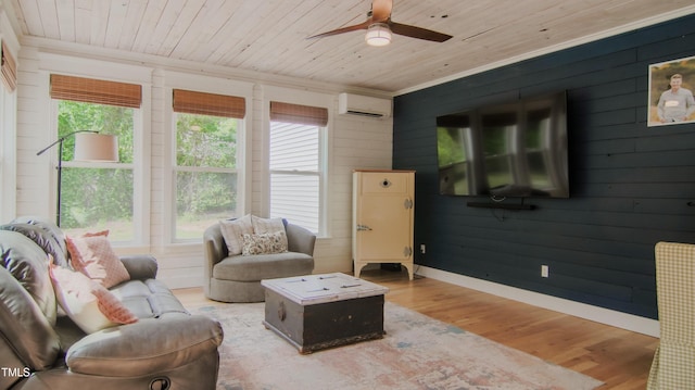 living room featuring light wood-type flooring, plenty of natural light, wood ceiling, and a wall mounted air conditioner