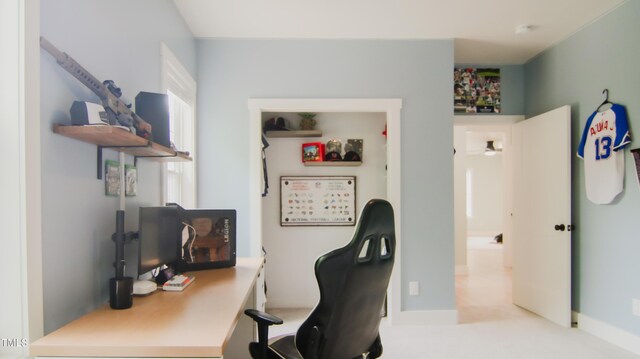 office with carpet floors and baseboards