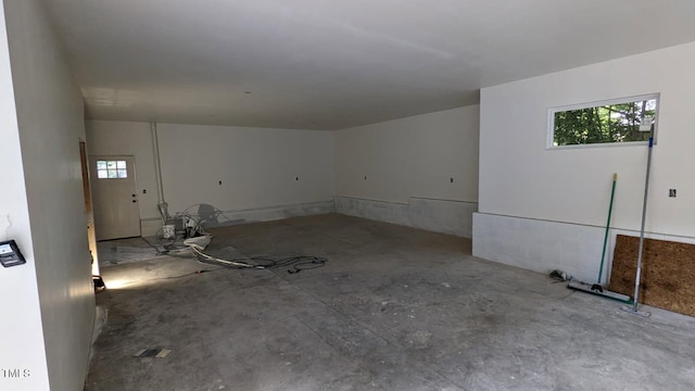 interior space featuring concrete flooring and a wealth of natural light