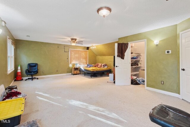 bedroom with baseboards, carpet flooring, and a ceiling fan