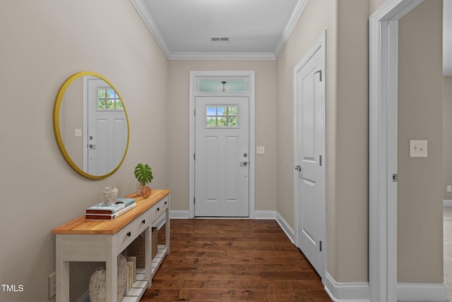 entryway featuring crown molding, baseboards, dark wood-style flooring, and visible vents