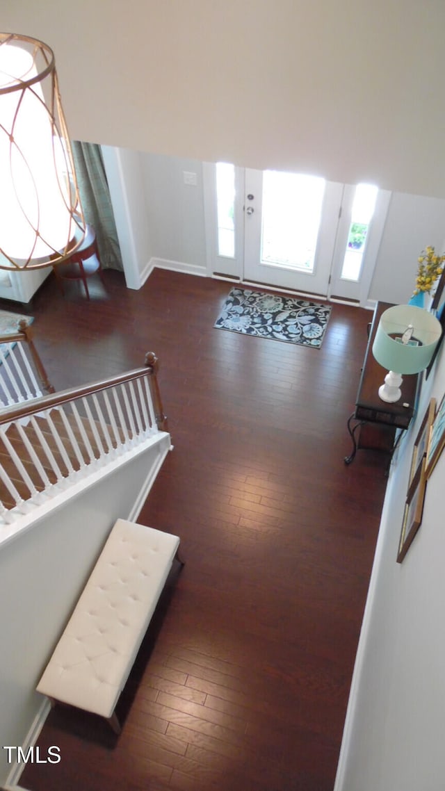 106 N Duelling Oaks Dr, Chapel Hill, NC 27517 - foyer entrance featuring dark wood-type flooring, baseboards, and stairway