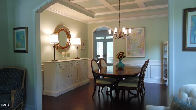 106 N Duelling Oaks Dr, Chapel Hill, NC 27517 - dining room featuring arched walkways, crown molding, a chandelier, coffered ceiling, and dark wood-style floors