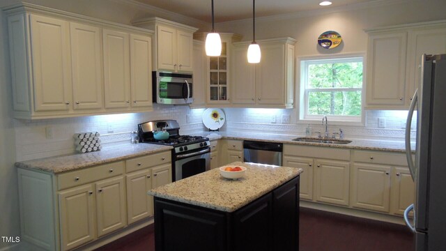 106 N Duelling Oaks Dr, Chapel Hill, NC 27517 - kitchen with appliances with stainless steel finishes, a sink, white cabinetry, backsplash, and crown molding