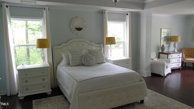 106 N Duelling Oaks Dr, Chapel Hill, NC 27517 - bedroom with crown molding, dark wood-style flooring, and ornate columns