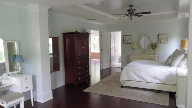 106 N Duelling Oaks Dr, Chapel Hill, NC 27517 - bedroom with dark wood-style floors, a raised ceiling, baseboards, and crown molding