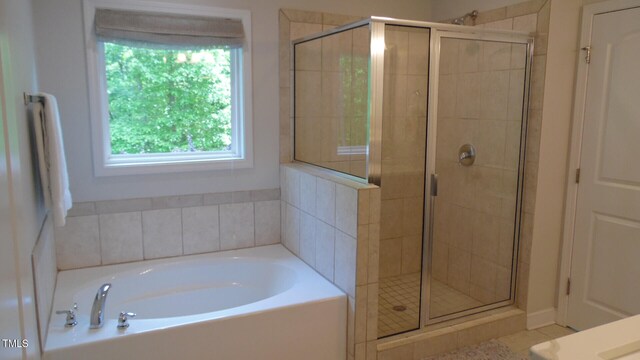 106 N Duelling Oaks Dr, Chapel Hill, NC 27517 - full bathroom with plenty of natural light, a bath, and a stall shower