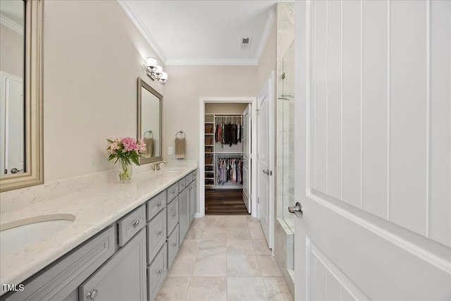 1533 Santa Lucia St, Wake Forest, NC 27587 - bathroom featuring double vanity, crown molding, a stall shower, and a walk in closet