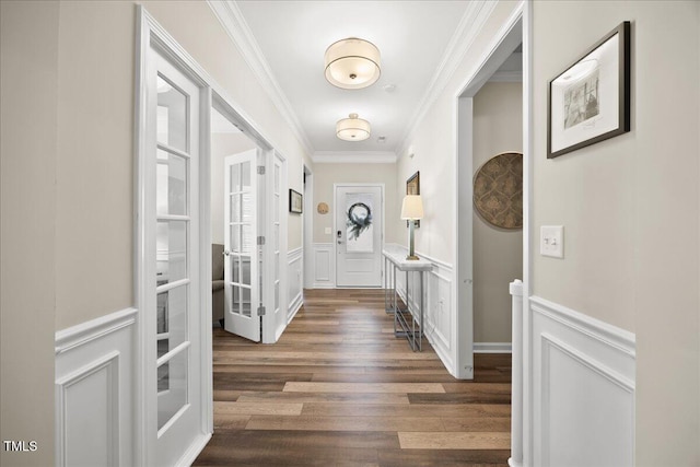 1533 Santa Lucia St, Wake Forest, NC 27587 - foyer entrance featuring crown molding, a decorative wall, wainscoting, and wood finished floors