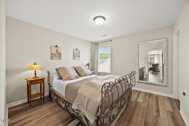 1533 Santa Lucia St, Wake Forest, NC 27587 - bedroom featuring wood finished floors and baseboards
