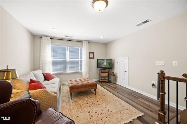 1533 Santa Lucia St, Wake Forest, NC 27587 - living room featuring dark wood-style flooring and baseboards