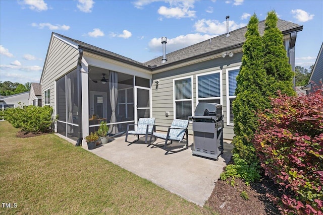 1533 Santa Lucia St, Wake Forest, NC 27587 - rear view of house featuring a sunroom, a patio area, and a yard