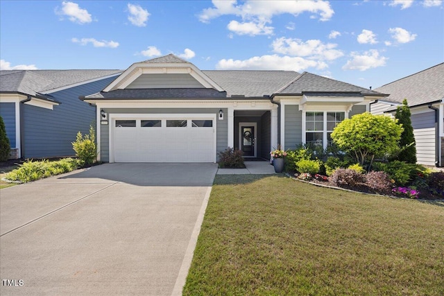 1533 Santa Lucia St, Wake Forest, NC 27587 - view of front of property featuring an attached garage, driveway, a front yard, and a shingled roof