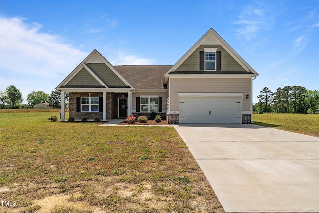 105 Seminole Fields Dr, Broadway, NC 27505 - craftsman-style home with concrete driveway, brick siding, and a front yard
