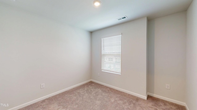 1314 Rosepine Dr, Cary, NC 27519 - spare room featuring light carpet and baseboards