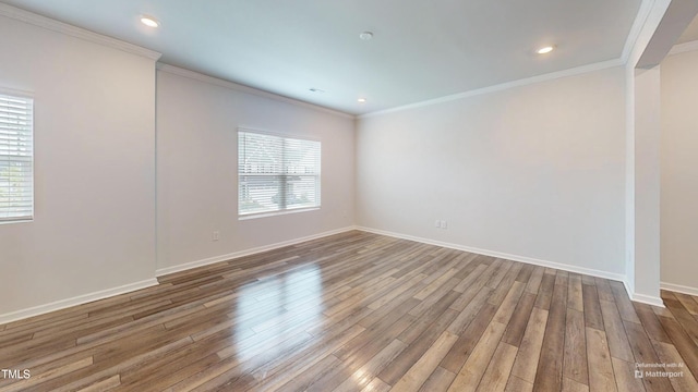 1314 Rosepine Dr, Cary, NC 27519 - unfurnished room featuring ornamental molding, wood finished floors, baseboards, and recessed lighting