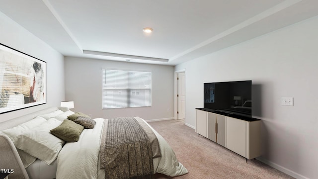 1314 Rosepine Dr, Cary, NC 27519 - bedroom featuring light carpet, baseboards, and a raised ceiling