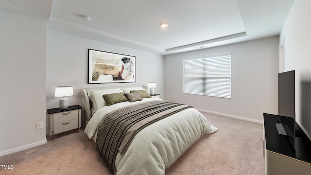 1314 Rosepine Dr, Cary, NC 27519 - bedroom with a raised ceiling, light carpet, and baseboards