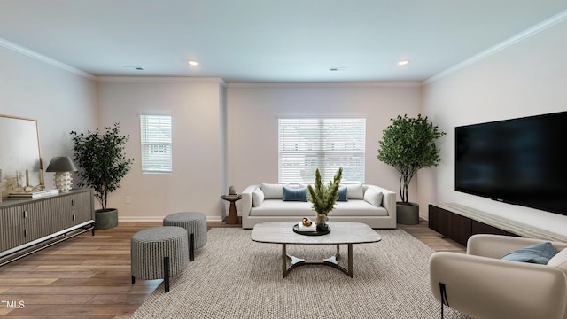 1314 Rosepine Dr, Cary, NC 27519 - living room featuring light wood-style floors, recessed lighting, crown molding, and baseboards