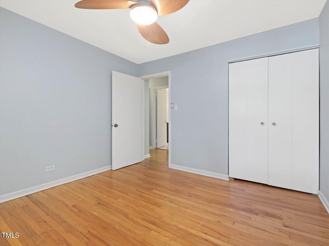 unfurnished bedroom featuring light wood finished floors and baseboards