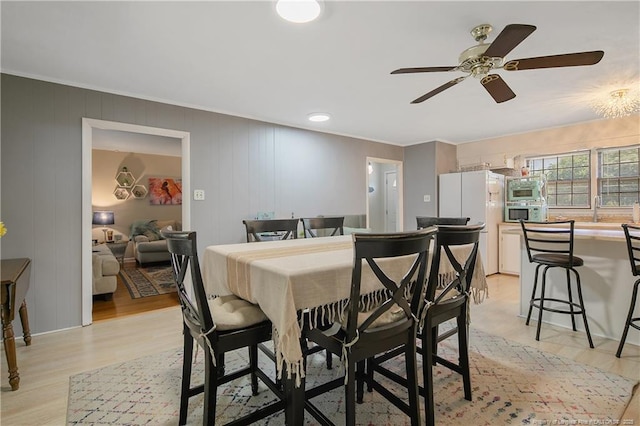 1810 Ashton Rd, Fayetteville, NC 28304 - dining space featuring light wood-style floors, ceiling fan, and crown molding