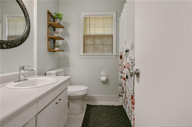 1810 Ashton Rd, Fayetteville, NC 28304 - full bath with vanity, tile patterned floors, and toilet