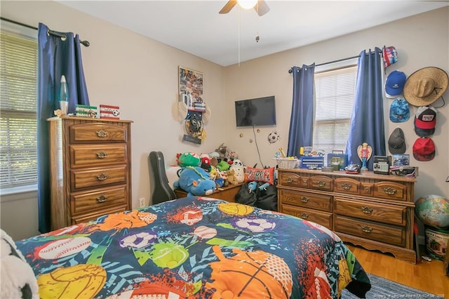 1810 Ashton Rd, Fayetteville, NC 28304 - bedroom featuring a ceiling fan and wood finished floors