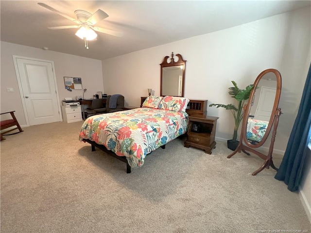 carpeted bedroom featuring a ceiling fan